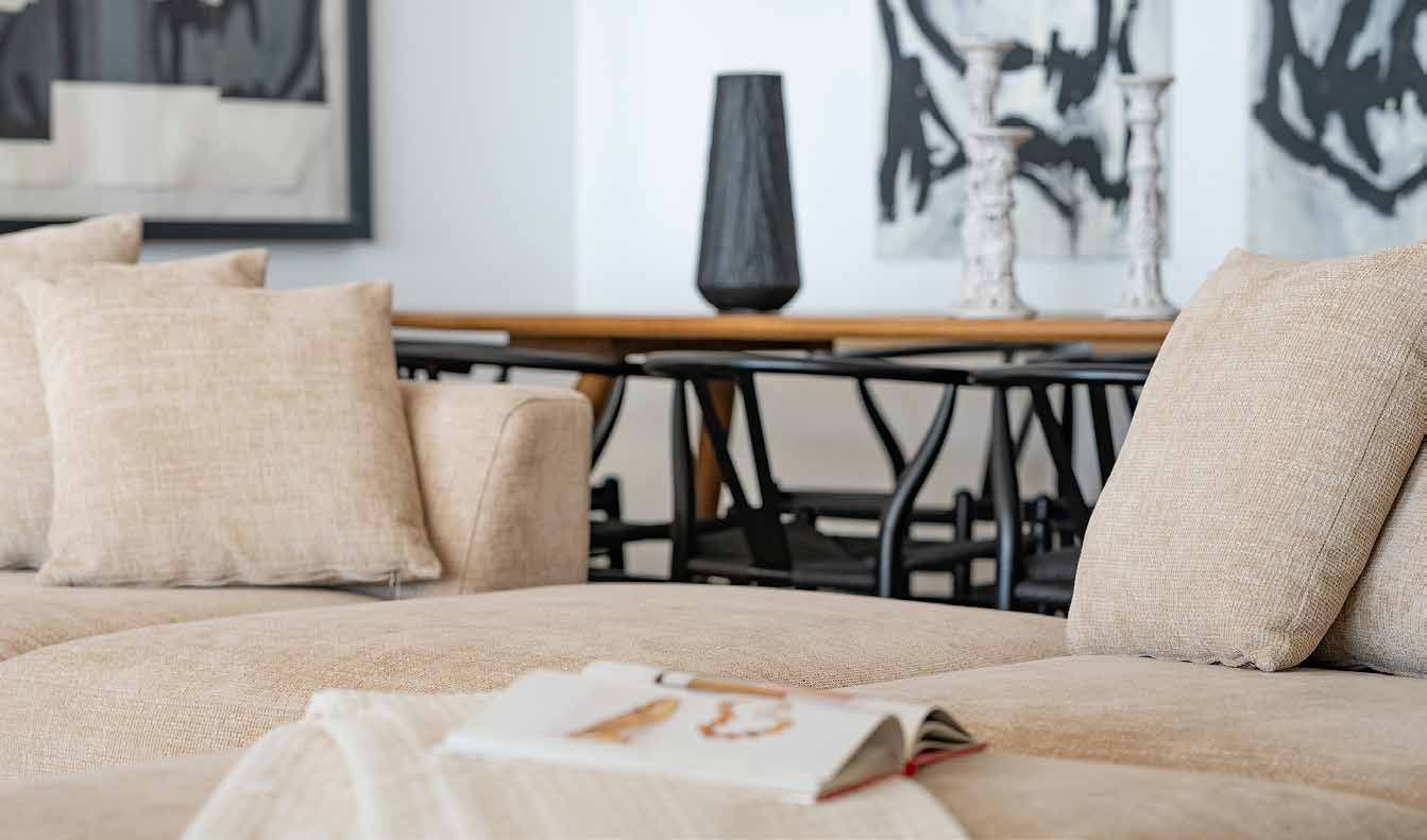 Furnished living and dining area in natural tones